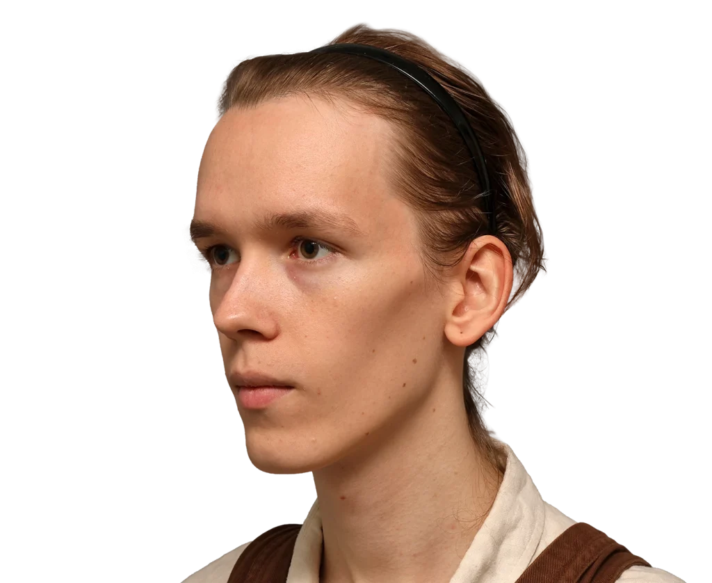 Portrait of a person in a black headband, neutral expression, facing left, wearing a beige shirt with brown straps